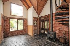 1011 Healesville Koo Wee Rup Rd Woori Yallock VIC 3139 $690,000 Over an Acre with Character Soaring ceilings welcome you when you enter this special two storey loft style home made of stone, recycled bricks and timber. The front entrance features leadlight panels, and some of the internal doors have decorative glass panels and handles. With three spacious living areas and three bedrooms, all with beautiful outlook to the surrounding gently undulating land of approx 1.4 acres (0.5998 ha), Shiloh is just waiting for a new family to enjoy all it has to offer. There is also extra storage or hobby space above the garage/carport, so come and explore for yourself and imagine what life could be like at Shiloh! Features Shed Built-In Robes Rumpus Room Remote Garage Floorboards Secure Parking