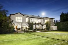 32 Kooyongkoot Road, Hawthorn VIC 3122 EXPRESSION OF INTEREST Contact Agent For Details 6 Bedrooms 4 Bathrooms 3 Parking FOR SALE An exquisite family oasis on 2,019m2 (21,732ft2 approx.) on the high side of esteemed Scotch HillThoughtfully designed by Shaw Architecture to embellish a modern indoor-outdoor entertainment lifestyle, this impressive six bedroom residence epitomises luxury with up-to-the-minute amenity and vogue interior design, on the high point of Hawthorn’s most coveted tree-lined street. Occupying approximately 2,019m2 (approx) and oriented with a north-west facing property, the enchanting gardens by Bott Landscaping solidify the home as a family oasis, with internal and external areas dedicated to both private seclusion and vibrant entertainment, including a full-sized mod-grass tennis court and gas heated in-ground pool. Beyond automated gates, a driveway lined in Ornamental Pears provides a magical welcome to the sprawling interiors. The bespoke design has spared no cost, with under-floor hydronic heating below Tectonic Oak floors, keeping a high level of comfort throughout the ground floor spaces. A customised cloak room, dedicated to simple practicality, keeps bags, coats and shoes at the entry from the three car remote garage, and a home office is placed at the entry for home business with fitted cabinetry. With recreation in mind, there is a room for every occasion – a leisure/billiards room provides private enjoyment for kids by the warmth of a gas fire, providing direct access to the outdoor entertainment zone. The open plan living area is ideal for regaling guests, segregated into formal dining, lounge, meals and private reading room, with two powder rooms, connecting to the outdoors through immense double glazed doors. The kitchen effortlessly caters large functions with a full-appointment of Neff appliances, including coffee machine, Circosteam combination oven, and warming drawer plus Liebherr wine fridge, and smartly dressed in Caesar stone and glass splashbacks with endless soft-closing cabinetry. A 1,000 bottle cellar, shrewdly placed adjacent the dining room, retains the perfect temperature with the French Fondis Winemaster system. Echoing indoor spaces, the outdoors also caters for recreation or private enjoyment serviced by automated irrigation from an underground 70,000L water tank. A vast alfresco dining space overlooks the pool, spa and tennis court, with an enchanting garden providing quiet seclusion under a towering sheoak tree, with gazebo and cubby house surrounded by an extensive range of matured trees. Accommodation is indulgent, each of the kids’ five generous robed bedrooms providing space for study, flanking a large upstairs retreat with a wide lounge balcony. Three ensuites (including 2x two-way ensuites) are lavishly tiled to ceilings with travertine, providing under-floor heating and Rinnai deluxe bathroom controllers, to limit temperature and water capacity. The master bedroom (sixth bedroom) pampers parents with a fitted dressing room, twin-basin Dark Emperadore marble ensuite with freestanding bath and cosmetic stone vanity, and in-built study. This coveted pocket of Scotch Hill provides easy transport options, with trams to connecting suburbs including Camberwell Junction, Glenferrie, Richmond and CBD, train connectivity and Monash freeway nearby, plus endless private school options including Scotch College, Bialik College, Loreto Mandeville Hall, St Catherine’s, St Kevin’s and MLC. An easy walk through tree-lined streets to Gardiner’s Creek walking and cycling tracks, and the nearby Kooyong Lawn Tennis Club provide recreation.