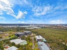C2402/7 Australia Avenue Sydney Olympic Park NSW 2127 $1,050,000 - $1,100,000 Split-Level Luxe This one of a kind two-level apartment situates on the top floors of an ultra-modern and secure high-rise apartment block. The spacious living area on the lower level flows to the sky balcony and overlooks amazing 180 degree water views of the Parramatta River, Sydney Olympic Park and Sydney CBD. All of which can also be seen from the chef's quality kitchen which features caesar stone bench tops, Smeg stainless steel appliances and gas stovetop. The second level contains both bedrooms that are also gifted with the same spectacular views. A main bedroom incorporates a walk-in wardrobe and ensuite whilst the second houses a built-in. The two luxury bathrooms in the home are complimented by a third toilet and powder room in the lower level laundry. Ducted air conditioning, video intercom, secure car space, storage cage and outdoor gas outlet add to the convenience of the apartment's surroundings. With trains, buses, cafs, popular restaurants and all that the Sydney Olympic Park precinct has to offer literally at your doorstep, this exceptional residence is a must see.