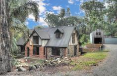 1011 Healesville Koo Wee Rup Rd Woori Yallock VIC 3139 $690,000 Over an Acre with Character Soaring ceilings welcome you when you enter this special two storey loft style home made of stone, recycled bricks and timber. The front entrance features leadlight panels, and some of the internal doors have decorative glass panels and handles. With three spacious living areas and three bedrooms, all with beautiful outlook to the surrounding gently undulating land of approx 1.4 acres (0.5998 ha), Shiloh is just waiting for a new family to enjoy all it has to offer. There is also extra storage or hobby space above the garage/carport, so come and explore for yourself and imagine what life could be like at Shiloh! Features Shed Built-In Robes Rumpus Room Remote Garage Floorboards Secure Parking