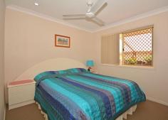 7 Stevens Cl Kawungan QLD 4655 $439,000 DOUBLE BAY SHED & COVER FOR THE VAN This home is neat as a pin and in an excellent location - not a busy road; a quiet cul de sac and yet close to Aldi & Stocklands. On the high side of the street, catching the breezes, this 4 bedroom home, with ensuite & WIR to the main bedroom and built ins to the other bedrooms, would make an ideal home for either retirees with their van or a tradie family who have toys and need a workshop area. The home has a huge outdoor entertaining area, air conditioning to the main bedroom, 4 KW solar power, security screens, internal access from the double lock up garage, paved green house area and a garden shed. The kitchen incorporates a breakfast bar, plenty of drawers and plumbing for the icemaker fridge. The dining/family room opens to the outdoor entertaining area - great for catering. With a separate lounge room, and the second living area, this ensures that everyone can watch the TV channel of their choice. There are ceiling fans and vertical drapes throughout the home with the second bathroom a good size and a separate toilet. Storage in the laundry and access to the paved area outside just contribute to a very neat, liveable home. Privacy and plenty of shade for the entertaining area is achieved with retractable blinds and decorative panels. The shed is 9m x 7m with 2 roller doors and a 2.9m opening while the carport fits a 21 foot caravan and boat. You need to see the inside of this home, so ring for an appointment. Property Features Land Size : 740 m2