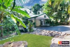 24 Hardwick St Stratford QLD 4870 $600,000's Enjoy The Serenity Of Stratford!!! Don't miss the Opportunity! Motivated Vendo Situated in the highly sought after suburb of Stratford is this beautiful four bedroom character home. Not only does it offer functional living it will win over your heart with its charm, superb finishes and seclusion. Catering for the most discerning buyer this home offers impeccable finishes throughout. From the stone kitchen benchtops to the absolutely stunning timber floorboards there is something to capture your eye around every corner. Set on a private 1050sqm of land with only one neighbour you are treated to a separate studio or teenagers escape and beautiful in ground swimming pool, both of which overlook the magnificent open space of the Jalarra Parklands. At A Glance: - Four generously sized, air-conditioned bedrooms with the master suite offering a walk through robe, ensuite and private balcony. - A generous family bathroom with large plunge bath. - Separate powder room downstairs. - A well-appointed kitchen which includes stone benchtops, stainless steel appliances and overlooks the outdoor entertainment area and parklands. - Open planned dining and lounge with separate studio overlooking Jalarra Park. - Outdoor entertaining timber deck. - Beautiful in ground swimming pool surrounded by natural rainforest. - Double carport. - 1050sqm of land - Built 1996 I encourage you to inspect this beautiful home. Please call me to arrange a time that suits you. Property Snapshot Property Type: House Land Area: 1,050 m2 Features: Ensuite Air Conditioning Built-In-Robes Close to Schools Close to Shops Close to Transport Pool