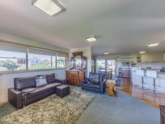 1 Henderson St Indented Head VIC 3223 $790,000 -$820,000 A Statement of Style Positioned with optimum northern exposure, showcasing views of Port Phillip Bay and only metres from the beach is a rarity indeed and not just its location. The home has been designed around bayside living with the well appointed kitchen forming an unobtrusive backdrop to the living area and flows directly to the undercover deck and seamlessly incorporates the garden. Boasting 4 bedrooms plus study over 2 levels ensures ample room for family & guests. Featuring numerous energy saving principles including large wrap around verandahs, solar electricity, large water storage servicing toilets, laundry & garden. An outstanding attribute, sure to impress is the oversized double garage with internal access, adjoining double carport & separate workshop. A blend of style & luxury this is a home you will be proud to call home and proud to share on many occasions. A popular hamlet of Indented Head allows for relaxation on a grand scale.