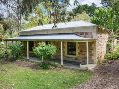 73 Pearson Rd Meadows SA 5201 $535,000 Stone Cottage on Three Acres Property ID: 10494114 Here is a great opportunity to purchase a stunning C1860 stone cottage that is complemented by original charm and timeless character with all the traditional favourites including high matchboard ceilings, gorgeous polished timber floors and three double bedrooms. This residence is privately positioned on three acres, in a quiet country road with a convenient location providing an abundance of opportunities for families, couples or the home improver. Instantly welcoming, the cottage presents with a classic kitchen complete with old wood stove, dishwasher, pantry and overlooks the tranquil garden setting. The cosy living area includes polished timber floor and slow combustion heater flows out onto the verandah through French doors. The separate dining room has an open fireplace, reverse cycle air conditioning and extensive timber windows showcasing the gardens. All three bedrooms are generous in size, the main bedroom comprises of open fireplace. There is a wrap around verandah at the front overlooking the established trees and lawn, a perfect place to relax and enjoy nature at its best. Other features include double garage/workshop and the external laundry, which is located just outside the back door. Features Include: • Three acres with mature native and exotic trees • Conveniently located • Kitchen with wood fire stove and dishwasher • Separate dining room with open fireplace • Living area with combustion heater • Three spacious bedrooms • Polished timber floors • High matchboard ceiling • Reverse cycle air conditioning • External laundry • Beautiful established gardens and lawn • Double garage/workshop • Ornate dam with jetty This property is conveniently located minutes to the small country township of Meadows in the beautiful Adelaide Hills, 40 minutes southeast of Adelaide CBD, 30 minutes to the coast and Southern Vales. A popular destination for tourist with its monthly country market, four day Easter Fair and well known Country Fair in October. Meadows also offers several historic buildings, a bakery, antique shops, craft shops, a winery, hotel, service stations, children’s playground with BBQ facilities and shady Battunga Park with full size Petanque court. For further information or to book an inspection please contact Gary Dawe on 0428 847 269 or 08 8388 3188. Building / Floor Area 132 sqm Land Area 3.0 acres