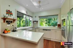 24 Hardwick St Stratford QLD 4870 $600,000's Enjoy The Serenity Of Stratford!!! Don't miss the Opportunity! Motivated Vendo Situated in the highly sought after suburb of Stratford is this beautiful four bedroom character home. Not only does it offer functional living it will win over your heart with its charm, superb finishes and seclusion. Catering for the most discerning buyer this home offers impeccable finishes throughout. From the stone kitchen benchtops to the absolutely stunning timber floorboards there is something to capture your eye around every corner. Set on a private 1050sqm of land with only one neighbour you are treated to a separate studio or teenagers escape and beautiful in ground swimming pool, both of which overlook the magnificent open space of the Jalarra Parklands. At A Glance: - Four generously sized, air-conditioned bedrooms with the master suite offering a walk through robe, ensuite and private balcony. - A generous family bathroom with large plunge bath. - Separate powder room downstairs. - A well-appointed kitchen which includes stone benchtops, stainless steel appliances and overlooks the outdoor entertainment area and parklands. - Open planned dining and lounge with separate studio overlooking Jalarra Park. - Outdoor entertaining timber deck. - Beautiful in ground swimming pool surrounded by natural rainforest. - Double carport. - 1050sqm of land - Built 1996 I encourage you to inspect this beautiful home. Please call me to arrange a time that suits you. Property Snapshot Property Type: House Land Area: 1,050 m2 Features: Ensuite Air Conditioning Built-In-Robes Close to Schools Close to Shops Close to Transport Pool