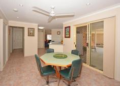 7 Stevens Cl Kawungan QLD 4655 $439,000 DOUBLE BAY SHED & COVER FOR THE VAN This home is neat as a pin and in an excellent location - not a busy road; a quiet cul de sac and yet close to Aldi & Stocklands. On the high side of the street, catching the breezes, this 4 bedroom home, with ensuite & WIR to the main bedroom and built ins to the other bedrooms, would make an ideal home for either retirees with their van or a tradie family who have toys and need a workshop area. The home has a huge outdoor entertaining area, air conditioning to the main bedroom, 4 KW solar power, security screens, internal access from the double lock up garage, paved green house area and a garden shed. The kitchen incorporates a breakfast bar, plenty of drawers and plumbing for the icemaker fridge. The dining/family room opens to the outdoor entertaining area - great for catering. With a separate lounge room, and the second living area, this ensures that everyone can watch the TV channel of their choice. There are ceiling fans and vertical drapes throughout the home with the second bathroom a good size and a separate toilet. Storage in the laundry and access to the paved area outside just contribute to a very neat, liveable home. Privacy and plenty of shade for the entertaining area is achieved with retractable blinds and decorative panels. The shed is 9m x 7m with 2 roller doors and a 2.9m opening while the carport fits a 21 foot caravan and boat. You need to see the inside of this home, so ring for an appointment. Property Features Land Size : 740 m2