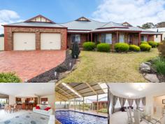9 Barrow Ct Mount Barker SA 5251 $745,000 The art of living fabulously! Property ID: 10516195 Elevated at the end of an inviting cul-de-sac on a generous 2369sqm allotment this property exudes style and elegance and will have you thoroughly impressed! The huge home offers five well proportioned bedrooms, three generous living areas, high ceilings and high end finishes! The 12 panel solar system is driven by a ‘solar river’ inverter and there is a separate solar system to heat the in ground salt chlorinated pool. The home offers style and character with brick quoin work, 2.7 metre high ceilings, high gable roof and front verandah and steel framework. The intelligent floor plan with three distinct living zones provides flexibility for harmony and peaceful living. All of the flooring offers diamond style tiling, together with ornate diamond style inserts at the front door entrance and the bedrooms are carpeted. The formal dining and lounge are also connected via a servery to the huge kitchen / family area. This family living area also offers a Mitsubishi split system. The kitchen is well appointed with central island bench, glass splash backs, double sink, Miele dishwasher. Omega range hood, gas stove top and separate wall mounted oven and microwave. Cupboard space is generous, including wall mounted glass fronted display cupboards and a walk in pantry. This north facing living area is light and bright with floor to ceiling windows and electric operated blinds. There are five bedrooms (one of which is currently used as an office) the other bedrooms offer two door floor to ceiling robes. The master bedroom is of excellent proportion with two feature hexagon design windows. The ensuite is also very spacious with separate toilet, corner spa, three door, three drawer vanity and a sizable shower alcove. The main bathroom offers a powder room with two door linen press, three door, three drawer vanity, the toilet is separate and there is a separate bath / shower area. The laundry has its own outside access and the hallway leads to the two car garage under the main roof with automated roller doors and there is also a roller door at the rear for vehicle access to the backyard. At the rear of the home is a 5m x 5m hip roof undercover entertaining area, complete with high end cafe blinds, notably there is also extensive brick paving, landscape walling and storm water provisioning. A high gable 15m x 10m three sided shed / together with a 6m x 2.5m extension, protects the inbuilt concrete fully tiled in-ground swimming pool, which is heated and salt chlorinated. Next to this complex is a separate 9m x 6m high gable lockable shed, with light and power and roller doors at both ends, this enabling a drive through to the rear grounds. The backyard beyond the pool offers a wonderful open space plus a Lemon, Apricot, Apple and Cheery tree, all of which are at a mature fruit bearing age. The front garden and lawns offer a fully automated watering system. Rain water from a 5000 gallon 20,000 litre tank and pressure pump is used for virtually 9 months of the year, given the extensive roof catchment from all of the buildings. All in all, a well planned, highly developed property on an inviting street with lovely views in the impressive, desirable, Waterford Estate. There are plenty of Community parks and gardens and now with the added significant Bald Hills overpass / underpass which provides residents easy access onto the freeway (thus saving about 10 minutes), to either Adelaide or Murray Bridge. Building / Floor Area 527 sqm Land Area 2,369.0 sqm