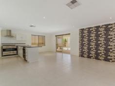 6 Ravenglass Cres Waikiki WA 6169 This motivated seller is looking at all reasonable offers up until 17th January 2017 when a decision will be made on which offer will be accepted. Offers presented prior to this date will also be taken into consideration and the seller may decide to act early and sell prior to this date. Located in the sought-after estate of Harrington Waters this property offers a good size four bedroom home on a low maintenance block with a huge backyard and great access through the garage. As you enter the home a large master bedroom is located to the right, complete with walk in robe and ensuite featuring double shower and closed off WC. To the other side of the entry is the theatre room, closed off with French doors, it is the perfect place to enjoy your favourite movie or just close off from the rest of the home for some quiet time. Progressing further into the home, the open plan design incorporates the family, dining and kitchen. With shopper's entry from the garage, the kitchen is well fitted with a freestanding Euromaid 900mm wide stainless steel stove, range hood and a Fisher and Paykel two drawer dishwasher. In addition to the double fridge recess with plumbing in place, this kitchen also offers walk in pantry and breakfast bar, perfect for serving up a quick meal. The minor bedrooms are located at the rear wing of the home and are all complete with built in robe. These rooms are serviced by the main family bathroom. Outside you will enjoy the huge open space that is overlooked by the paved alfresco that has been extended with a large patio compete with limestone hard form flooring, perfect for entertaining your guests all year round. A large garden shed is located at the rear of the yard and still provides space for you to install a large workshop, pool, or both. Other great features of this home include: - Ducted evaporative airconditioning - LED downlights throughout - 8 solar panels with the ability to expand, utilising the 3.2 Kw inverter on a 47c tariff. - Gas Hot Water System - Fully reticulated lawns and gardens Get in quick and submit your offer ASAP so you do not miss out on this fantastic opportunity. Call David Parlor on 0412 734 727 to arrange your private viewing. *The description provided is for general information purposes only. ACTON Rockingham/Baldivis believes that this information is correct but it does not warrant or guarantee the accuracy of the information. Buyers are asked to undertake independent due diligence investigations and enquiries regarding the property, as no responsibility can be accepted by ACTON Rockingham/Baldivis for any information that may be deemed incorrect.