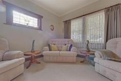 56 Risby St Ulverstone TAS 7315 $290,000 Location and Character Originally built in 1939 and situated on a large block (1047m2) this lovely family home has been tastefully renovated. The verandah at the front and the leadlight windows give it that character of yesteryear. The welcoming hallway is wide and takes you to four generous size bedrooms, (one is currently used as a sitting room). Access the open plan living area through double glass doors. The galley style timber kitchen at one end has a breakfast bar. The dining and lounge areas follow. French doors open out to the spacious deck overlooking the neat garden. The laundry and the bathroom are at the rear of the home. Outside is a large garage/workshop with an adjoining carport. The backyard is level and has a veggie patch, fruit trees and room for kids to play. This immaculate home is situated within walking distance from the CBD and schools. You'll love it! General Features Property Type: House Bedrooms: 4 Bathrooms: 1 Land Size: 1047 m2