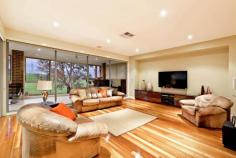 43 Cathedral Rise Doreen VIC 3754 Lavish entertaining & low maintenance living Sale by Negotiation Purpose built for lavish entertaining and low maintenance living, this stunning residence - the builder's own - offers grand proportions, luxurious finishes and an outstanding alfresco entertaining area that is sure to impress. Set on a 1236m2 (approx.) landscaped allotment, the formal lounge is complemented by a spacious family living and dining area with gas log fire. The stone finished entertainer's kitchen offers a full suite of quality European appliances, including integrated coffee machine and butler's pantry. Integrated storage solutions are abundant in the expansive rumpus that opens to a superb private alfresco area with outdoor kitchen and an uninterrupted view across grazing land. The master suite features a fitted dressing room and stone ensuite including dual vanities, spa and double frameless shower, while an additional three bedrooms share a well-appointed family bathroom. The lower level introduces an 82m2 (approx.) multipurpose room with an independent entry. The large space is fitted with a kitchenette and powder room, making it perfect for a kids retreat, home office or both. A long list of extra features include a fitted study, porcelain tiles, timber floors, imported designer fittings, ducted heating and cooling, workshop and sprinkler system - everything you need for a wonderful, low maintenance lifestyle.