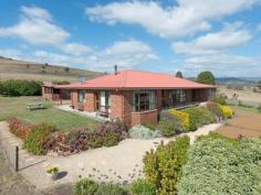 1001 Lyell Hwy Sorell Creek TAS 7140 $750,000 "Sunnyside" With spectacular views over the River Derwent, Sunnyside is located at the gateway to the magnificent Derwent Valley. The land slopes gently from the road frontage and has a perfect northerly aspect. This area is recognised for its 'terra rossa' soils - (a type of red clay soil produced by the weathering of limestone), this soil structure is quite rare and is identified as being the perfect medium for producing premium wines and cherries. The future for "Sunnyside" could well be in a very exciting horticultural enterprise. Alternatively you might continue with a small scale grazing operation or house the families' horses. The spacious, entertainers home is perfect in every detail. Set in easy care gardens with an outdoor BBQ room and a gazebo that adjoin the 1st class tennis court. It is a great home for happy families looking for a convenient and healthy lifestyle. Attention to detail, excellent craftsmanship and sunny river views are testament to the design and thought process that has resulted in a meticulously presented, quality home, in a superb position. - Very realistic auction expectations - Irrigation water from permanent, reliable TasWater system - Gently sloping, north facing, productive soil types - "Mediterranean climate" - minimal risk of late frosts (vineyards, cherries) - 20 minute commute to Hobart CBD - Large shearing shed/workshop 3 2 3 General Features Property Type: Rural Bedrooms: 3 Bathrooms: 2 Land Size: 30.81 Hectares Peter Wade Real Estate Agent