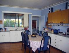 24 Marsh St Wellington NSW 2820 $200s Comfortable, large & family friendly. Property ID: 8339608 Have you an extended family, then this home may be just what you are looking for. Situated on a well fenced parcel of land some 1,808 sqr mtrs in area that also accommodates the double lock up garage plus other storage areas still leaving plenty of yard to enjoy is this enormous family home. Inside is an equally impressively floor plan that offers 5 bedrooms most with built in wardrobes while the master bedroom has an ensuite bathroom and French doors to a private alfresco verandah. The kitchen is very roomy and has a combustion wood heater strategically placed to keep Jack Frost away in the cooler months. There is dining room with an adjacent loungeroom with French door access to the return verandah. Potential exists to utilise the separate self contained building for in-law, teenage or parent retreat; what a bonus! The home lends itself perfectly for the next owner to add their own signature to its decor. Images reflect properties at the time when the photos were taken or in some cases at an earlier point. Seasonal changes & maintenance can affect the current presentation and prospective purchasers are urged to use them as a guide only.