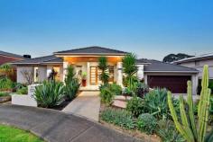 43 Cathedral Rise Doreen VIC 3754 Lavish entertaining & low maintenance living Sale by Negotiation Purpose built for lavish entertaining and low maintenance living, this stunning residence - the builder's own - offers grand proportions, luxurious finishes and an outstanding alfresco entertaining area that is sure to impress. Set on a 1236m2 (approx.) landscaped allotment, the formal lounge is complemented by a spacious family living and dining area with gas log fire. The stone finished entertainer's kitchen offers a full suite of quality European appliances, including integrated coffee machine and butler's pantry. Integrated storage solutions are abundant in the expansive rumpus that opens to a superb private alfresco area with outdoor kitchen and an uninterrupted view across grazing land. The master suite features a fitted dressing room and stone ensuite including dual vanities, spa and double frameless shower, while an additional three bedrooms share a well-appointed family bathroom. The lower level introduces an 82m2 (approx.) multipurpose room with an independent entry. The large space is fitted with a kitchenette and powder room, making it perfect for a kids retreat, home office or both. A long list of extra features include a fitted study, porcelain tiles, timber floors, imported designer fittings, ducted heating and cooling, workshop and sprinkler system - everything you need for a wonderful, low maintenance lifestyle.