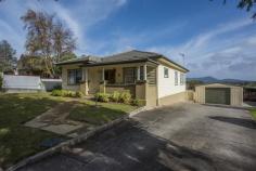 56 Risby St Ulverstone TAS 7315 $290,000 Location and Character Originally built in 1939 and situated on a large block (1047m2) this lovely family home has been tastefully renovated. The verandah at the front and the leadlight windows give it that character of yesteryear. The welcoming hallway is wide and takes you to four generous size bedrooms, (one is currently used as a sitting room). Access the open plan living area through double glass doors. The galley style timber kitchen at one end has a breakfast bar. The dining and lounge areas follow. French doors open out to the spacious deck overlooking the neat garden. The laundry and the bathroom are at the rear of the home. Outside is a large garage/workshop with an adjoining carport. The backyard is level and has a veggie patch, fruit trees and room for kids to play. This immaculate home is situated within walking distance from the CBD and schools. You'll love it! General Features Property Type: House Bedrooms: 4 Bathrooms: 1 Land Size: 1047 m2