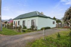 1901 Lyell Hwy Lawitta TAS 7140 $229,000 Huge investment opportunity This would have to be one of the best investment properties that has appeared on the market for sale. These 2 conjoined units produce a combined $400 per week rent for a fantastic yield of over 9%, what a return for your investment. The units are almost a mirror image of each other. Both have 2 bedrooms, separate lounges and open plan kitchen dining rooms as well as their own private backyards. Situated at Lawitta about 3kms to New Norfolk town centre and 35kms to Hobart. General Features Property Type: Block of Units Bedrooms: 4 Bathrooms: 2 Land Size: 890 m2