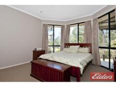 9 Turpentine Dr Cedar Vale QLD 4285 $479,000 Country Charm with this Family Home This is a lovely family home, the 9’ceilings give this home a spacious and airy feeling, and there is plenty of room for the family to spread out. In true “Coral Home” style there is two living areas: the formal lounge with detailed cut out walls and the second one is the fully tiled open plan kitchen, dining and family room (comes with air-conditioner), this room is adjacent to the outdoor entertainment area which will make family functions a pleasure. The main bedroom is large and comes with a walk-through robe and ensuite and its located away from the other 3 bedrooms – all 3 bedrooms come with built in robes and ceiling fans. The home comes with a double integral garage and the added bonus is another big shed (11m x 6m) with power and a small shed on the side, there is also the cost saving 5Kva Solar power system. The backyard is very private and comes with a unique Rustic Theme Gazebo, chicken pen and plenty of room for a vege patch, this section of the backyard is fully fenced but there is more land beyond so if you are ever wanting a pony or a couple of sheep there is plenty of room for another paddock. The Rustic Theme has been repeated at the front of the home with an outback fence and dry creek bed with deck, it’s been beautifully done and is a striking feature of this lovely home. Set on a 1 acre block and located in the great Cedar Vale lifestyle estate, this home is just waiting for you, there is school bus pick up in the area too. Property Details Elders Property ID: 10680104 4 bedrooms 2 bathrooms 4 car parks Land Area 4141 square metres 4 car garage