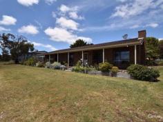 50 Warrawee Terrace Penneshaw SA 5222 $440,000 Desirable Northerly Aspect & Bay Views! This beautiful & exceptionally well presented family sized home, is well positioned in the picturesque township of Penneshaw to capture pleasant ocean views of the Penneshaw Beach and ferry dock. Offering the peace of mind of the durability of brick construction and low maintenance living, the home is north facing, and enjoys the benefit of being on a 2000m2 corner allotment, providing space and privacy from neighbours. Internally, the home has a spacious comfortable feel, with all bedrooms large in size with built in robes and walk in robe to the master bedroom. The generous sized kitchen is central to the dining area and has servery through to the more casual or informal family room. The main lounge has in built slow combustion fire and overlooks the front garden area with distant views of the ocean. Fully landscaped to the front and rear yard, this property is a wonderful example of house proud owners, that have taken great pride in their property both inside and outside. There is also a 3 bay garage and 4 water tanks. Inspection is welcome and is clearly the best method to fully appreciate the extent of what the property can offer you. In addition, the large allotment size of 2000m2 presents with great opportunity, with the new sewer system currently being installed in Penneshaw, a land division (stcc)would enable a second dwelling to be built on the lower level of the land, adding value to your investment! Exciting things are happening on Kangaroo Island, make a time to inspect this property today! Contact long term local resident selling agent Michael Barrett on 0427 727 333 anytime. PROPERTY DETAILS $440,000 ID: 389280 Land Area: 2000 m² Zoning: Residential