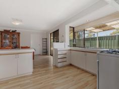 19 Kurrajong Rd Safety Bay WA 6169 $300,000's CHARMING HOME AND A HUGE BACKYARD! Positioned on a large 704sqm block in Safety Bay, this property would be perfect for anyone wanting a huge back yard that is ready for a pool or workshop, or for someone who is just looking for a wide open space to enjoy with the family. The property offers a good size lounge which enjoys a front yard outlook and flows through to the separate dining area which has been cleverly redesigned into a study nook with built in desk and shelving. The spacious living area occupying the centre of the home is overlooked by the open plan kitchen that offers additional access through to the front of the home. Complete with good bench space, gas stove and rangehood, the kitchen enjoys views out to the patio and is ideally located for entertaining visiting guests. Each of the bedrooms are located to the rear of the property and are serviced by the updated bathroom that has been modernised with glass screen shower and chic vanity. Outside, the patio provides a great entertaining space that overlooks the rear yard which is complete with raised garden beds, two sheds and a huge lawn which is ideal for adding a swimming pool or workshop. Located at the rear of the single garage is a good size brick workshop or storeroom, perfect for a man cave or just storing additional belongings from your new home. Other features include: - Ducted reverse cycle A/C - Potential drive through side access - Automatic bore reticulation With everything that the Safety Bay area offers, you'll have the benefit of schools, parks, beaches and shopping all just a few minutes away - you could not ask for a better location or property! Contact David Parlor on 0412 734 727 for a private viewing.
