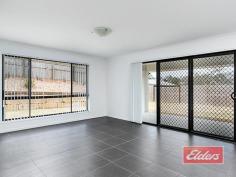 9 Honeysuckle Court Jimboomba QLD 4280 $433,000 Stylish Home, Prime Position A rare opportunity to enjoy an elevated position at the top of this small and select cul de sac of just 10 homes, within walking distance of the local parks and schools, in this attractive and very progressive location. A home of distinction awaits your inspection, from that stylish rendered / rock façade on through the practical no nonsense floor plan and out to the back yard beyond, on this fully serviced 900 sqm block, I think you’ll find a bright and comfortable home, with a range of attractive features. The carpeted formal lounge or media room, enjoys views to the front of the property, and offers a room that’s perfectly proportioned with the added benefit of those stylish yet practical window shutters. The fully tiled family and dining room again offers a balance between style and functionality, with stacker patio doors (and security screens) gliding back to give uninterrupted access to the al fresco dining area, which has been incorporated under the main house roof, while the reverse cycle air conditioner will ensure your comfort throughout the year. A substantial 5 burner gas cooking range, with electric oven awaits your inspection, complimented perfectly with abundant caesarstone bench tops with extensive high and low line cupboards, offering plenty of storage space in this attractive kitchen area. Caesarstone extends to both bathrooms, with a twin vanity unit and oversize shower featuring in the en-suite (with separate toilet closet) of this very spacious master bedroom, which also boasts an equally spacious walk-in robe. Double built-ins, then should come as no surprise in each of the other three bedrooms. Cupboard space too is good news, with double linen in the hall plus a separate broom cupboard and then another linen cupboard in the laundry as well. And as you will have seen in our images, there is the obligatory double lockup with internal access, in this case with a timber style door in keeping with timber front door which contracts exceptionally well with the rendered façade. The kid and pet friendly back yard is fully fenced, with plenty of level yard for everyone to enjoy, which has been thoughtfully separated from the garden area by that substantial sandstone retaining wall. So if you have been looking for a suitably stylish yet practical place to call home, enjoying a prime and elevated position here in a quiet cul de sac, within easy reach of an array of facilities, then an early inspection is highly recommended. Property Details Elders Property ID: 10609775 4 bedrooms 2 bathrooms 2 car parks Land Area 900 square metres Double garage
