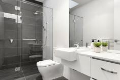 33A Vine Street, Moonee Ponds VIC 3039 Simply luxurious, this new, architect-designed, three bedroom, three bathroom town residence exudes sophistication. Boasting sublime appointments and city views, it delivers an enviable lifestyle afforded by a premium address, moments to vibrant Puckle Street, restaurants, bars, public transport and prestigious schools. A louvered façade affirms contemporary flair simultaneously strengthening security. Clerestory windows, statement skylights, 2.7m ceilings and a favourable rear northerly aspect assure an abundance of natural light throughout an extensive interior. Living areas are lined with oak whilst bedrooms enjoy the extravagance of superior woollen carpets underfoot. The state-of-the-art Smeg-appointed kitchen is a faultless expression of function and form defined by waterfall Caesarstone counters, 900mm stainless steel cooking appliances, integrated dishwasher, bronzed mirrored splashbacks and plentiful touch-open/soft-close cabinetry. Vast open living spaces progress to an outdoor zone conceived for entertaining. Frameless wide showers and stone-topped vanities are evident in two deluxe, fully-tiled ensuite bathrooms plus the central which also presents a freestanding bath. Assuring resplendent accommodation each floor hosts a master bedroom. There’s also a relaxing retreat, study alcove, BIRs/WIRs, double remote garage (via ROW), video intercom, security alarm, powder room, extensive joinery, multiple split systems and water tank. Professionals, families and downsizers will think Christmas has already arrived!