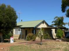 28 Coate St Katanning WA 6317 $109,000 Great Starter House - Property ID: 909235 Situated in a quiet Street and within walking distance to town. The home consists of a formal lounge at the front of the home. A central kitchen which has near new floor coverings. With three bedrooms there is plenty of room for a family. The bathroom is opposite bedroom number three and the toilet comes off the laundry. To the right of the home is a single carport and a well-fenced yard is to the left of the home. This property won't last long at this price. Features Land Size Approx. - 587 m2 Close to Schools Close to Shops Close to Transport Formal Lounge