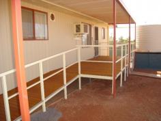 12 Bacchus St Iron Knob SA 5601 $135,000 Impressive Modernized Home Property ID: 3466370 Excellently presented three bedroom home with colourbond roof with carport under main roof. Like new inside with a modern kitchen, tiled bathroom, all bedrooms carpeted with built in robes to two rooms. Outside has timber decking to the front and rear under shady verandah. Includes reverse cycle airconditioner and garage with concrete floor, power and lights..