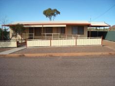 12 Bacchus St Iron Knob SA 5601 $135,000 Impressive Modernized Home Property ID: 3466370 Excellently presented three bedroom home with colourbond roof with carport under main roof. Like new inside with a modern kitchen, tiled bathroom, all bedrooms carpeted with built in robes to two rooms. Outside has timber decking to the front and rear under shady verandah. Includes reverse cycle airconditioner and garage with concrete floor, power and lights..