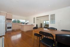 1/11 Farnell Place Glenorchy TAS 7010 $275,000 Spick & span, sunny & spacious This fantastic four bedroom home in a quiet cul-de-sac, yet only minutes from Northgate and the Glenorchy CBD, is sure to impress the astute buyer looking for a house that represents excellent value. There are four bedrooms, two of which are doubles, polished hardwood floors in the livings areas, semi open plan kitchen, dining, and lounge room, all presented in a neat and tidy well-presented package. With a number of units behind the house providing extra security, there is no active body corporate to worry about. A secure backyard lawn area perfect for a dog, the children to play safely, or a barbeque with friends, this humble home ticks all the boxes for a first home buyer, expanding family, or investment at $350 per week. With so much room for activities; the rumpus has a multitude of different uses, pool room, man cave, or second living area. The utilities room could be converted into a second bathroom. • Quite, sunny, and spacious rooms • 4 bedrooms 2 of which are doubles • Sunny and open plan kitchen & dining • Rent appraisal of $350 per week • No active body corporate • Rumpus perfect for a pool room • Separate laundry & utility room • Flat, low maintenance garden & lawn • Quiet cul-de-sac position • Only minutes to Glenorchy CDB • North-facing verandah • Polished hardwood floors General Features Property Type: House Bedrooms: 4 Bathrooms: 1 Land Size: 494 m2