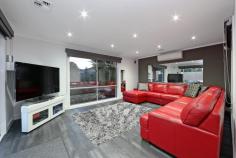 21 Landsborough Ave Rowville VIC 3178 $890,000 The Perfect Family Home With Extra Garaging Sale by SET DATE 11/4/2017 (unless sold prior) This beautifully presented and renovated family home has everything taken care of and is perfectly equipped with comfort and space. Stunning commercial grade flooring and LED down lights flow throughout the home creating a warming and bright ambience, and the living is easy with CBUS Home automation. You can enjoy movie nights in the comfort of your own home in the spacious home theatre and you'll love the well-appointed home office with built in desks and storage. The hub of the home hosts an impressive kitchen with servery window opening to the Alfresco and beautifully landscaped gardens. Glass splashbacks and stainless steel appliances including a 900mm oven/cooktop adorn this spacious kitchen which overlooks a luscious atrium and lovely dining room. Proceed upstairs to the family's private quarters where you'll find three generous sized bedrooms with BIR's, family bathroom and linen press. The kids can work, play or relax in the spacious kids retreat equipped with built in storage and the lovely master bedroom has WIR and ensuite. There is ample space for cars and your toys, workshop or more storage for the tradesman with two garages and additional enclosed storage area. This amazing property also has two 3000ltr water tanks, CCTV, separate rumpus, refrigerated cooling, ducted heating, tinted windows, dishwasher and under stair storage. Features Workshop Ducted Heating Reverse Cycle Air Con Rumpus Room Outdoor Entertainment Area Study Alarm System Air Conditioning Price Guide: $890,000 Plus | Type: House | ID #554974