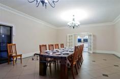 250 Martin Hill Rd Forreston SA 5233 $2,150,000 LUXURY COUNTRY LIVING AT ITS BEST Property ID: 10072660 The ultimate in luxury living with a 68.5 acre playground offering peace, security and privacy in this large gracious c2003 residence set in a wonderful landscaped garden. The residence takes in the magnificent views of the surrounding countryside. The residence features 5 bedrooms, formal living, formal dining, informal dining and state of the art kitchen. Admire the extensive garden with its exotic trees and scrubs from the all round verandah. The 27.72Ha (68.5 acres) property offers prime hills grazing and supported by excellent shedding and water supply. Special features: c2003 solid brick residence built to the highest standards and finish. Large formal entrance with a welcoming Mosaic patterned floor. Formal living – timber skirtings & architraves, slow combustion heater and Italian tiles. Formal dining – designed for gracious entertainment on a grand scale with bay window overlooking the property and surrounding countryside. Luxury kitchen with stainless steel ‘Smeg’ 90 cm 6 hob gas cooktop and electric oven, dishwasher, ‘Black Galway’ granite bench tops and walk-in pantry. Box room/cellar off the pantry. Main bedroom with RC/AC, slow combustion heater, French windows that open to the garden & verandah. Very generous walk-in robes, plus a 5 star ensuite that features a 4 person spa, shower, white granite top basin unit, marble floor and floor to ceiling marble tiles. 4 other generous bedrooms (all carpeted and built-in robes. Tiled long hall with built-in cupboards running the full length. Luxury main bathroom with marble tiles and separate wc. Verandahs surround the residence. Laundry – fully tiled, 3rd wc & hand basin. Rumpus, which double as an extra kitchen and features an all important pizza/bread oven. Garden: The maturing garden has been planted with the future in mind, starting with the Golden Elm lined driveway to the rich shady English Oaks that are scattered around the garden. The needs of the kitchen have been considered with a large number of Olives, Chestnuts and other fruit trees planted to reap the benefit of this productive land. Other improvements: 14m x 6m s/f workshop/implement shed with conc. floor, power & light. Rainwater storage – 100,000 gal. Quality bore – 50 megl water licence. Fenced into 10 main paddocks. Land: The 27.72 Ha (68.5 acres) ranges from flat to very gently undulating grazing country with stock water. The land has been well managed with a good fertilizer history and a sensitivity to the need to preserve our native vegetation. Inspection highly recommended and strictly by appt. Land Area 27.72 hectares
