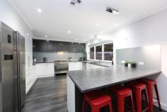 21 Landsborough Ave Rowville VIC 3178 $890,000 The Perfect Family Home With Extra Garaging Sale by SET DATE 11/4/2017 (unless sold prior) This beautifully presented and renovated family home has everything taken care of and is perfectly equipped with comfort and space. Stunning commercial grade flooring and LED down lights flow throughout the home creating a warming and bright ambience, and the living is easy with CBUS Home automation. You can enjoy movie nights in the comfort of your own home in the spacious home theatre and you'll love the well-appointed home office with built in desks and storage. The hub of the home hosts an impressive kitchen with servery window opening to the Alfresco and beautifully landscaped gardens. Glass splashbacks and stainless steel appliances including a 900mm oven/cooktop adorn this spacious kitchen which overlooks a luscious atrium and lovely dining room. Proceed upstairs to the family's private quarters where you'll find three generous sized bedrooms with BIR's, family bathroom and linen press. The kids can work, play or relax in the spacious kids retreat equipped with built in storage and the lovely master bedroom has WIR and ensuite. There is ample space for cars and your toys, workshop or more storage for the tradesman with two garages and additional enclosed storage area. This amazing property also has two 3000ltr water tanks, CCTV, separate rumpus, refrigerated cooling, ducted heating, tinted windows, dishwasher and under stair storage. Features Workshop Ducted Heating Reverse Cycle Air Con Rumpus Room Outdoor Entertainment Area Study Alarm System Air Conditioning Price Guide: $890,000 Plus | Type: House | ID #554974