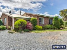 10 Junction Rd Mole Creek TAS 7304 $349,000-$369,000 A MUST SELL A tidier small-holding would be hard to find. This smart three bedroom brick home sits proudly surrounded by over eight hectares of the most gorgeous country anywhere. The mountain scenery is magnificent, enveloping this gentle valley setting. Bordering the eastern boundary of this level property is a trout creek reserve with a pristine limestone stream meandering through farmland toward Mole Creek and, ultimately, the Mersey River. Inside you will find an open plan modern kitchen with picture-perfect Mount Roland views and integrating the dining and lounge areas, three bedrooms (two with built-ins), bathroom, separate W/C, plus laundry. So many extras accompany this rural offering including 16 solar panels, 12mx7m lockable Colorbond double garage with workshop, 4-bay machinery shed, garden and wood sheds as well as chook run. A small mixed orchard graces one side of the circular driveway. Water is abundant and includes rainwater tanks as well as an inexpensive communal creek water system for gardens and toilet. Very good fencing surround paddocks, lending them to animals, cropping, orchard, or small fruit production. Only 80km to Cradle Mountain National Park and conveniently serviced by the nearby Mole Creek township for fuel, PO, groceries and more, this perfect lifestyle property is located less than an hour from Launceston. General Features Property Type: House Bedrooms: 3 Bathrooms: 1 Land Size: 7.97 Hectares
