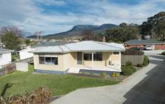 1/11 Farnell Place Glenorchy TAS 7010 $275,000 Spick & span, sunny & spacious This fantastic four bedroom home in a quiet cul-de-sac, yet only minutes from Northgate and the Glenorchy CBD, is sure to impress the astute buyer looking for a house that represents excellent value. There are four bedrooms, two of which are doubles, polished hardwood floors in the livings areas, semi open plan kitchen, dining, and lounge room, all presented in a neat and tidy well-presented package. With a number of units behind the house providing extra security, there is no active body corporate to worry about. A secure backyard lawn area perfect for a dog, the children to play safely, or a barbeque with friends, this humble home ticks all the boxes for a first home buyer, expanding family, or investment at $350 per week. With so much room for activities; the rumpus has a multitude of different uses, pool room, man cave, or second living area. The utilities room could be converted into a second bathroom. • Quite, sunny, and spacious rooms • 4 bedrooms 2 of which are doubles • Sunny and open plan kitchen & dining • Rent appraisal of $350 per week • No active body corporate • Rumpus perfect for a pool room • Separate laundry & utility room • Flat, low maintenance garden & lawn • Quiet cul-de-sac position • Only minutes to Glenorchy CDB • North-facing verandah • Polished hardwood floors General Features Property Type: House Bedrooms: 4 Bathrooms: 1 Land Size: 494 m2
