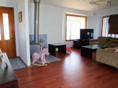 5 Pearse Street Singleton NSW 2330 $375,000 Jerrys Plains - 1.49 Acre Lifestyle Property This neatly presented 3 bedroom home is situated on approximately 6069 sqm (1.49 acres set over 3 titles) and features: * Floating timber floors, combustion fireplace, reverse cycle air conditioner. * Separate lounge & dining areas, laminate kitchen with good sized pantry. * Built in robes & ceiling fans to all bedrooms. * 9m x 5m covered deck, 3 bay lockable shed, fully fenced paddock. * Town water, 5000 gallon water tank, well with pump. This property has a lovely outlook and is located approximately 25 minutes from Singleton & Muswellbrook