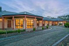 250 Martin Hill Rd Forreston SA 5233 $2,150,000 LUXURY COUNTRY LIVING AT ITS BEST Property ID: 10072660 The ultimate in luxury living with a 68.5 acre playground offering peace, security and privacy in this large gracious c2003 residence set in a wonderful landscaped garden. The residence takes in the magnificent views of the surrounding countryside. The residence features 5 bedrooms, formal living, formal dining, informal dining and state of the art kitchen. Admire the extensive garden with its exotic trees and scrubs from the all round verandah. The 27.72Ha (68.5 acres) property offers prime hills grazing and supported by excellent shedding and water supply. Special features: c2003 solid brick residence built to the highest standards and finish. Large formal entrance with a welcoming Mosaic patterned floor. Formal living – timber skirtings & architraves, slow combustion heater and Italian tiles. Formal dining – designed for gracious entertainment on a grand scale with bay window overlooking the property and surrounding countryside. Luxury kitchen with stainless steel ‘Smeg’ 90 cm 6 hob gas cooktop and electric oven, dishwasher, ‘Black Galway’ granite bench tops and walk-in pantry. Box room/cellar off the pantry. Main bedroom with RC/AC, slow combustion heater, French windows that open to the garden & verandah. Very generous walk-in robes, plus a 5 star ensuite that features a 4 person spa, shower, white granite top basin unit, marble floor and floor to ceiling marble tiles. 4 other generous bedrooms (all carpeted and built-in robes. Tiled long hall with built-in cupboards running the full length. Luxury main bathroom with marble tiles and separate wc. Verandahs surround the residence. Laundry – fully tiled, 3rd wc & hand basin. Rumpus, which double as an extra kitchen and features an all important pizza/bread oven. Garden: The maturing garden has been planted with the future in mind, starting with the Golden Elm lined driveway to the rich shady English Oaks that are scattered around the garden. The needs of the kitchen have been considered with a large number of Olives, Chestnuts and other fruit trees planted to reap the benefit of this productive land. Other improvements: 14m x 6m s/f workshop/implement shed with conc. floor, power & light. Rainwater storage – 100,000 gal. Quality bore – 50 megl water licence. Fenced into 10 main paddocks. Land: The 27.72 Ha (68.5 acres) ranges from flat to very gently undulating grazing country with stock water. The land has been well managed with a good fertilizer history and a sensitivity to the need to preserve our native vegetation. Inspection highly recommended and strictly by appt. Land Area 27.72 hectares