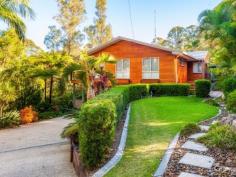 151 Vise Rd Mons QLD 4556 $625,000 Owners Have Purchased Another Property – This Property Will Be Sold Located on Vise Road on the northern side of Buderim, this beautiful tranquil home sits atop a 5,000m2 lush green block and enjoys genuine privacy and seclusion yet located only 15 minutes to coast beaches and just a few minutes to Buderim and Maroochydore shopping. The home itself is tiered over two levels, with a stunning main entrance via a paved path and hedge line taking you to the front door. Mature tropical gardens surround the home on both sides and create a wonderful ambience. The driveway leads underneath the home with room for two vehicles plus plenty of toys. There are storage sheds under the home and a second entrance to the lower level of the property. The lower level of the home consists of a large living area and dry bar with plenty of storage, a laundry and bathroom. With its own private entrance and plenty of room the lower section of the home would be a perfect teenage retreat or potential for dual living with very little adaptation required. Upstairs the home has a wide open living area with two distinct zones on either side of the central kitchen. The air-conditioned master bedroom overlooks the tree tops of the beautiful block. Bedrooms two and three are positioned at the front of the home, with air-conditioning also servicing the living area and bedroom two. The tiled living area extends out to the quintessential, outdoor covered entertaining zone that the family will enjoy all year round. As you begin to meander through the block the pool is immediately to the side of the home as too are the boxed garden beds, clothes line and plenty of room in a separate flat area for a chook house for the kids to tend to. The front section of the block has terraced walkways and wonderful gardens throughout. Midway along the block is a large flat area with a pergola, dam and a perfect camping and play area for the kids. The block then extends down further into natural bushland which will give hours of exploration. * Lifestyle living on a 5,000m2 block with plenty of room for the kids to explore * Potential for dual living with a separate entrance to lower level * Large open tiled living areas with fantastic outdoor entertaining options * Air-conditioned master, living and bed two * Lush tropical landscaped gardens with private dam and your own campgrounds This is a wonderful lifestyle option just minutes to the beach and shops. PROPERTY DETAILS $625,000 ID: 389709 Land Area: 5000 m²