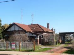 43 Clive St Katanning WA 6317 $159,000 Main Street Appeal House - Property ID: 914998 Situated on the Main Street of town and set on a large 1042m2 block with rear access via the back lane way. Character brick and tile home with a central formal lounge and large back family room. To the right of the house are the carport and garage. Being so close to town and amenities this home has heaps of potential. Features Land Size Approx. - 1042 m2 Close to Shops Close to Transport Secure Parking Formal Lounge