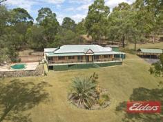 18 Saturn Ct Cedar Vale QLD 4285 Large Colonial home - must be SOLD! A job transfer to Western Australia has changed all the plans this family had for this big home - so it’s got to be sold as they are staying put in W.A. They were partially through the renovations, so there is some work still to be done, so here is your opportunity to purchase the home and make it exactly what you want. It’s a very big home and it boasts 6 bedrooms (all air conditioned), 3 bathrooms, formal lounge, open plan dining and kitchen, family room and a large fully screened and covered sun room. There are polished timber flooring, 9’celings with decorative ceiling roses, gas cooking and solar hot water system. The home is a Colonial style and has great street appeal, with a large front bull nosed veranda looking out to the 2 acres, there is also a salt water inground pool with a very large concreted area, a 6m x 6m shed and a 3-bay carport. The location of this house is quiet and peaceful, it’s in a cul de sac street and is placed right at the back of the block, it’s only a short drive to connect to the Mt. Lindesay Highway so a commute into Brisbane would be a breeze. If you wanted some animals there is a dam on the block, the home is connected to Council trickle feed water and there is school bus pickup in the area. This house must be sold and is going to Auction on the 25/3/2017 at 10am – come and have a look I know you will be impressed with the size and all that this home offers. Property Details Elders Property ID: 11102937 6 bedrooms 3 bathrooms 5 car parks Land Area 8500 square metres 5 car garage