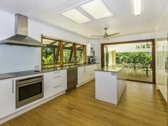 91 Lanita Rd Ferny Grove QLD 4055 UNLIKE ANYTHING ELSE YOU'VE SEEN BEFORE Situated in the quiet North Western Brisbane suburb of Ferny Grove and set on 2 lots. The expansive 9,358m2 offers an array of possibilities for future subdivision or to simply enjoy having an acreage lifestyle with suburban convenience. With multiple indoor/outdoor entertaining areas, this home offers absolute seclusion framed by leafy surrounds, designed for cross breeze ventilation all year round. Enter through the front door into the lounge room and you're greeted with exposed raked timber ceilings, beautiful Bamboo floating timber floors and Jetmaster fireplace. This area is the perfect place to relax and unwind with the family. On one end of the home, the four great sized bedrooms are located. They offer built in robes, crisp tones and lush carpet, and the main bedroom features a contemporary ensuite. The gourmet kitchen is a culinary haven and features include Cesarstone benchtops, stainless steel appliances, pantry and an abundance of bench space and kitchen storage. Make your way outside through bi-fold doors to the expansive covered Alfresco entertaining area. This stunning, covered area overlooks the fully fenced sparkling in-ground swimming pool and lush, green surrounds. The atmosphere surrounding the 'Alfresco' entertaining area, Bali Hut and stunning in-ground salt water pool is private & ambient and would be the ideal place to entertain all year round. Other notable features of this statement property include a teenagers retreat, study nook, car accommodation for two vehicles and workshop area. Nestled in family friendly Ferny Grove and within close proximity to Train Station, Ferny Grove State and High Schools, local shopping village, numerous parks, and walking and bike tracks, you simply must inspect this unique property. Enquire today. PROPERTY DETAILS EXPRESS SALE ID: 394190 Land Area: 9358 m²