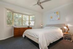 18 Killeen Cl Buderim QLD 4556 Buderim Queensland Entertainer on Large Block When size matters, a 926sqm property in the heart of Buderim is sure to get your attention. This high-set home offers all you could want in coastal living, with its elevated position capturing those cool breezes. This fully renovated home and functional floor plan is perfect for the family with four bedrooms, two bathrooms, generous kitchen, hardwood outdoor undercover entertaining area, wrap around Queenslander deck at the front for those lazy afternoons and a huge front yard for the kids to play in. Perfectly presented, the home has beautiful polished hardwood timber floors throughout and white walls which keeps the house neutral. Add to that the beautiful timber french doors leading out to the undercover entertaining makes it perfect for friends and family to enjoy those late afternoon BBQ's. The spacious master bedroom has its own walk-in robe, ensuite with well-appointed fittings, above bench square basins and large square tiling and the main bathroom has a full length bath to relax in. A split-system air-conditioner along with a ducted exhaust system which takes the cool air into the bedrooms, they are also fitted with ceiling fans. The kitchen has cottage style cabinetry with double sided storage and a large pantry, stone benches with an inset stainless sink and mixer. Fresh stainless appliances including a dishwasher, electric stove and ceran cooktop with a full length tiled splash back. On the lower level the home has ample storage with 2 garden sheds and a double lock up garage, with extra storage and electric doors. This truly is a family home thanks to its large front yard, cul-de-sac location and its proximity to some of the coast's best schools including Mountain Creek State School, Matthew Flinders Anglican Collage and Sienna Catholic College which are just a short drive away. Headland Golf Club is also just a short drive away and the local shops are close by. - Elevated Queenslander decked home, capturing cool breezes - Perfect family home in a quiet cul-de-sac location on a massive 926sqm - 4 bedrooms, 2 bathrooms, double lock-up garage with extra storage - Outdoor under-cover hardwood entertaining deck for your BBQ's - Beautiful polished timber floors throughout & carpeted bedrooms - Air-conditioning with ducted exhaust system & ceilings fans in bedrooms - Fully renovated & well-appointed bathrooms and kitchen PROPERTY DETAILS UNDER CONTRACT ID: 392804 Land Area: 926 m²