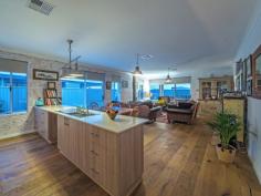 9 Persian Street Eglinton WA 6034 Built by Celebration Homes in 2015 this immaculately presented, professionally interior decorated home is set on a large 450sqm block. This 4 bedroom, 2 bathroom home has all the upgrades you are looking for. From timber flooring to essa stone bench-tops to quality light fittings. Its sure to impress! * High ceilings and moulded skirting throughout * Large master bedroom with walk in robe and shutters * Luxurious en-suite with his and hers basin set on essa stone bench-top * Built in double robes and TV points in 3 other bedrooms * Open plan kitchen, living and meals area * Gourmet kitchen with 900mm gas cook-top set on essa stone * A large walk in pantry, double fridge recess and dishwasher recess * Industrial style lighting over kitchen bench-top * Enclosed theatre room with feature bulkhead ceiling * Walk in linen room adjacent to laundry * Zoned reverse cycle ducted air conditioning * Wood burner in main living area * Decked alfresco with gorgeous native plants in garden for easy maintenance * Liquid limestone to side yard * Ample parking fitting up to 4 cars on driveway Features Built-In Wardrobes Fireplace(s) Garden