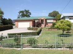 65 Church St Quirindi NSW 2343 $400,000 Spacious & Stylish Beautifully presented & stylish 4 bedroom, 2 bathroom, double garage brick veneer home located on a large 2,023sq.m parcel of land with rear laneway access. Modern solid timber kitchen with pantry. Open plan kitchen& family room. Large formal lounge & dining room. Covered and gauzed entertainment area plus outdoor BBQ area. Main bedroom with B-I-Robe, ensuite & sliding door to back entertainment area. Large ensuite with shower, vanity & toilet. Main bathroom with bath, shower, vanity & separate toilet. Two reverse cycle A/C for year round comfort. Formal entry & double garage with internal access. Double colour bond garage with power & rainwater tank. Landscaped & established lawns & gardens. Quiet & private location with rear lane access. Great care has been undertaken to create this magnificent home. Don't miss your opportunity to inspect this outstanding property. Further information please contact Luke Scanlon 0419 495147, Ray White Quirindi on (02)67461270, or visit our website at www.raywhitequirindi.com.au