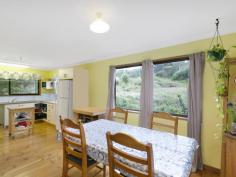 67 Kidston St, Canungra QLD 4275 This 3 bedroom home is ideal for the person looking to do a bit of renovating. A fresh coat of paint, update some furnishings and this could be the bargain you’ve been waiting for. Timber floors throughout and wide verandas gives it the country feel that many search for in a property in the hinterland. Double car accommodation under the house as well as the laundry, enough space lends itself to extending the home if required. Set on 1333m2 with lovely views overlooking the mountains and bushland. If you are looking for that tree change that won't break the bank, this could be the one, well worth an inspection.