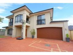 191A Grand Promenade, Bedford WA 6052 Designed with a relaxed lifestyle in mind, this spacious & quality built 4 Bedroom 3 Bathroom 4 Toilet, two storey home offers a flexible floor plan which caters for the entire family and for every occasion. From the moment you enter this home with its grand entry foyer with porcelain flooring & high ceilings, you will realise this is a home of generous proportions with large open plan lounge & dining featuring porcelain flooring & quality window treatments. The stunning chefs kitchen comes complete with Corian bench tops, plenty of cupboards, corner pantry, island bench, 900mm gas cooker & canopy range-hood, dishwasher, fridge recess and more. The downstairs master suite has an en-suite bathroom, separate toilet, walk-in robe and has easy access to the living areas. Downstairs you'll also find a centrally located powder room for your guests and a generous laundry with plenty of built-in cupboards and bench. The upstairs sitting room has a convenient built-in kitchenette, great for those late night snacks and is within easy access to the upstairs bedrooms. Also upstairs you’ll find three other double size bedrooms (BIRs), two complete with their own bathroom and a second master suite with its own en-suite bathroom and built-in robes. This home has many of the conveniences you would expect in a home of this calibre, including reverse cycle air conditioning (7 split systems), feature ceilings, quality floor coverings & window treatments, chandeliers and automated watering system to the low maintenance gardens. There is a two car auto garage with shopper’s entry & and a large office/store room, ideal for all your storage needs. Positioned on 408sqm rear strata “easy care block” within easy reach of public transport, local shopping, schools, parks and only a short drive to Galleria Shopping Centre, Dianella Plaza, Coventry Village, ECU, Mt Lawley/Embleton/Yokine Golf Courses, café strips and so much more. This property is to be sold by way of an "Express Sale". All offers to be presented by 5.00pm Monday 22nd May 2017. The Seller reserves the right to accept an offer prior to the Express Sale date without notice. For further details, please call Geoff Wyllie on 0418 909 540