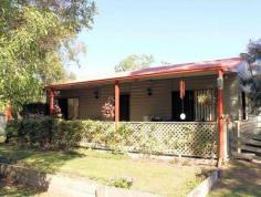 15 Dunn St, Aldershot QLD 4650 Sitting in quite a private spot with a country feel and plenty of bird life, this low maintenance 2 bedroom home is ready and waiting for new owners. Featuring open plan living, landscaped gardens and rural views, this home offers functionality, easy care and peaceful rural living. 2 bedrooms Open plan living and dining Raked ceiling in living area Ceiling fans throughout and air-conditioning to main bedroom 6m x 6m powered shed with electric roller door Caravan port and powered automatic gate for driveway Garden shed 2 x 5000 gal rainwater tanks Fully fenced and landscaped 1012sqm corner allotment For your private inspection of this property please call Merv Smith now.