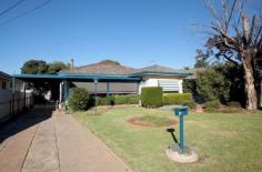 17 Montgomery St, Ashmont NSW 2650 This much loved three-bedroom home plus home office set on 641sqm block with drive through access to a delightful leafy backyard. On offer the master bedroom with ensuite, built-in robe and ceiling fan. The remaining bedrooms also with ceiling fans. A generous size formal lounge/dining room plus a very neat and tidy kitchen with new hot plate, wall oven, double sink plus walk-in pantry. The main bathroom has both a shower and spa bath plus a separate toilet. Year round comfort with ducted cooling, slow combustion fire, two gas outlets plus a new split system air conditioning unit. Excellent storage throughout the home plus a spacious internal laundry. Outside a handy mans dream with a powered shed with workshop, garden shed, built-in bar-b-q area and bird aviary or animal enclosure. Other added features include lovely timber floors, covered front porch, carport and beautiful established gardens. *All information contained herein is gathered from sources we believe to be reliable, however, we cannot guarantee its accuracy and interested persons should rely on their own enquiries.
