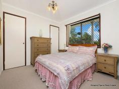 165 Hubner Rd, Park Ridge QLD 4125 Situated on a 1.06 hectare fully fenced block in the prestigious suburb of Park Ridge, this spacious home provides the perfect acreage lifestyle. Offering all the space, privacy and comforts of acreage life along with the convenience of town water and being only minutes to local primary and high schools and the shopping precinct Park Ridge Town Centre. At the front of the home is a porch area where you can sit and enjoy the peace and quiet of acreage living. As you step into the tiled entrance you are greeted by the large carpeted lounge room to the left with bay window, adjoining this room is a carpeted formal dining area that has security screen door access to the fantastic outdoor covered entertaining area with built in sink. To the right of the entrance area is a carpeted bedroom with 2 single wardrobes. As you walk through the entrance there is a good-sized tiled family room with ceiling fan and glass sliding door access to the rear yard. At the heart of it all is the large tiled kitchen with a near new upright electric oven, rangehood, dishwasher and large fridge space. The kitchen also includes a single door pantry and a double door pantry, and an abundance of cupboard and bench space. There is also a storage area underneath the stairs. Also, featured downstairs is an internal laundry with security screen door access to the backyard, adjoining the laundry is a bathroom. At the end of the hallway is a large carpeted bedroom or multi-purpose room with fireplace and wardrobe. This room includes security screen door access to the front porch and glass sliding door access to the backyard. Upstairs you will find 3 carpeted built in bedrooms with ceiling fans. One of these bedrooms includes air conditioning and 2 of these bedrooms have glass sliding door access to the balcony that overlooks the front yard. These bedrooms are serviced by the family bathroom with double vanity and separate toilet. Other features of the home include security screens throughout, double linen cupboard, full pressure town water, water tank, solar power and a 6 x 10 metre garage with 2 roller doors. Take advantage of the opportunity to enjoy the peace and tranquility of this picturesque acreage setting. The zoning for this property is emerging community. Don’t delay, call to arrange an inspection today! The local area has well-established infrastructure, is set to experience future residential growth, and is flourishing with energy, enthusiasm and diversity. Situated within a short distance to Park Ridge Town Centre, the park and ride bus terminal into Brisbane and major retail and commercial precincts. The Logan and Gateway Motorways provide easy access to the Brisbane Airport (30 minutes), Sunshine Coast (60 minutes) and the Gold Coast (40 minutes).