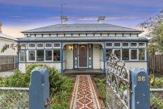 26 Mayne St, Invermay TAS 7248 Heritage Charm Meets Modern Appeal in Renovated Cottage. This renovated period cottage blends heritage charm with modern style set on a generous block with beautiful established gardens, conveniently located close to Invermay Primary School, Invermay shopping centre, moments to the university, and just seven minutes’ drive to Launceston CBD. * Open-plan kitchen/dining room opens to alfresco entertaining * Renovated kitchen with electric cooking and stainless steel dishwasher * Renovated main bathroom with separate bath and shower, plus vanity * Master bedroom with built-in robes; additional study, play room or fourth bedroom * Separate utility room with second toilet; wood fired pizza oven and vegetable garden * Fenced backyard with children’s cubby house for safe and secure play time * Internal laundry; carport plus additional off-street parking * Solar panels, solar hot water and NBN connected This superbly renovated period homes impresses from the moment you enter with polished timber floors, high ceilings, decorative arch and stained glass windows creating an immediate impact in the entry hall. The open-plan kitchen/dining room opens onto the alfresco entertainer’s patio. The large renovated kitchen features electric cooking and stainless steel dishwasher, and the main bathroom features separate bath and shower. All three bedrooms, with original open fire places, are generous in size and the master bedroom features built-in wardrobes and lead light windows. The fenced backyard with established gardens and lawn also features a children’s cubby house, wood fired pizza oven, vegetable gardens and utility room with the second toilet which could be converted to a family room or granny flat subject to council approval. An internal laundry, carport and additional off-street parking complete the package. Don’t let this stunning home slip through your fingers. Call Jodie Hucker to organise an inspection today.