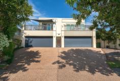 1/28 Birt Avenue, Surfers Paradise QLD 4217 - Superior quality 2 storey solid brick construction - Impressive foyer. Gorgeous casual living/dining area - Open plan entertainer's dream kitchen. Super-storage - Scenic u/cover balcony/bbq area. Views to main river - Ultra-classy formal lounge & dining. Powder room - Master bedroom with spa ensuite & large walk-in robe - + 2 spacious bedrooms/built-in robes. Family bathroom - Large multi-purpose room accessing lovely rear garden - Solid timber floors & staircase. Invisible blinds - Intercom, vacuumaid & security system & screens Flawless design and top quality craftsmanship shine in this thirty square two-storey villa in the picturesque, highly sought-after Budd's Beach area. Prestigiously located it's just a short stroll along the picturesque tree-lined street from the wide main river, boat launching jetty, Budd's Beach Reserve - a favourite water-side park and picnic area - and in convenient proximity to the bustling Surfers Paradise CBD. Visual impact is immediate in the tastefully decorated entry foyer which narrows to an attractive long, light hallway with high ceilings and a pleasing colour palette flowing tranquilly throughout the home. - On the ground level we have a large family bathroom, an excellent laundry/workroom with mega-storage, two spacious bedrooms and, at the end of the corridor, a gorgeous ultra-large air conditioned room with luxurious window treatments, built-ins and benchtop which could serve as a complete teenage retreat, a media room, expansive home office or another living area. Glass doors open to a colourful rear garden and stylish al fresco relaxation. - Upstairs the light-washed living areas are an absolute delight with the family living area spilling out to a scenic balcony and views across to the water - the perfect venue for barbeques or just to relax with a good book and a glass of wine. The adjoining dining area merges with a galley-style gourmet kitchen - a chef's dream - which boasts excellent storage, walk-in pantry and Bosch appliances. Privately positioned next to the kitchen the ultra-spacious formal area combines a sophisticated dining room and lounge, - an impressive venue for special dinners and lavish celebrations. Passing the discretely positioned powder room we continue along to the sumptuous master suite, absolutely resplendent with its large spa ensuite and long walk-in robe. This villa has been meticulously planned and built, incorporating a noise-inhibiting concrete-filled wall, long-life termite-free treatment for the wonderful expanse of solid flooring and stair-casing, the extensive use of invisible blinds providing privacy without obstructing light or views and the abundance of windows sun-soaking the entire home. A beautifully positioned residence of visual superiority, quality and class which will be fully appreciated by the discerning buyer.
