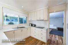 16 Whitfeld St, Monash ACT 2904 Position and Presentation Set on a quiet tree lined street only moments from quality schools, shops and public transport is this fully renovated three bedroom family home. All the hard work has been done enabling you to take back your weekends and enjoy a more relaxed and easy lifestyle. This single level family home takes advantage of its sunny aspect and enjoys an abundance of natural light and sunshine with large floor to ceiling windows. The home features new spotted gum hardwood timber flooring and new carpets, curtains and paint throughout. The kitchen is also new and modern with quality appliances, plenty of custom built storage and flows effortlessly to a large covered outdoor entertaining area. The family friendly rear garden is dotted with established fruit trees, is secure and low maintenance and has a secure storage shed plus additional storage area to the side of the property. Car accommodation is provided by a single garage with additional off street parking. Both bathroom and ensuite have been completely renovated and both have underfloor heating installed and a television above the bath in the bathroom. Loads of extras make this house a home such as Samsung keyless entry to the front door, crimsafe sliding door to the rear and installed Bosch alarm system. With nothing else to do except move in and enjoy, this is an ideal lifestyle opportunity! * Single level three bedroom family home * Updated and modernised throughout * Newly renovated bathroom and ensuite with underfloor heating * Stunning new kitchen with quality appliances * Ducted gas heating throughout plus split systems to living area and main bedroom * Spotted gum hard wood timber flooring * New carpet to bedrooms * Painted throughout in lovely neutral tones * Built-in robes to all of the bedrooms * Rinai hot water system * Ceiling fans to living area, kitchen,main bedroom and bedroom two * Easy care landscaped gardens and family friendly secure rear garden * Single car garage with extra off street parking * Samsung keyless front door entry, alarm system and crimsafe door rear sliding door * Close proximity to Monash Primary School, public transport and Erindale Shopping Centre and Tuggeranong CBD